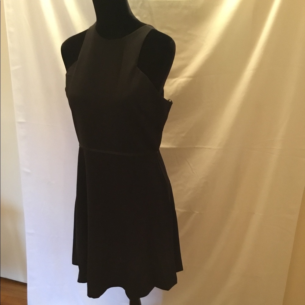 LBD. Mid length black dress.
